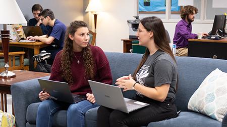 Students tutoring in the writing center