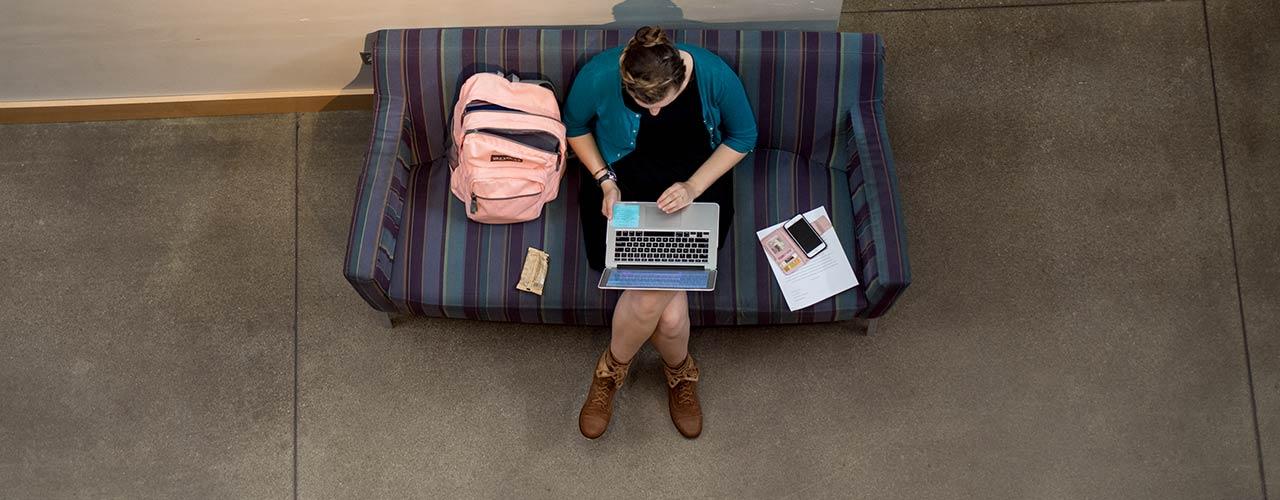 Student working on a laptop