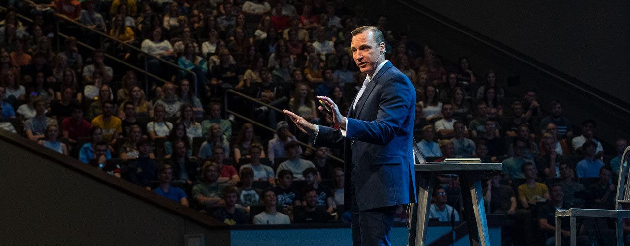 Dr. White leading chapel.